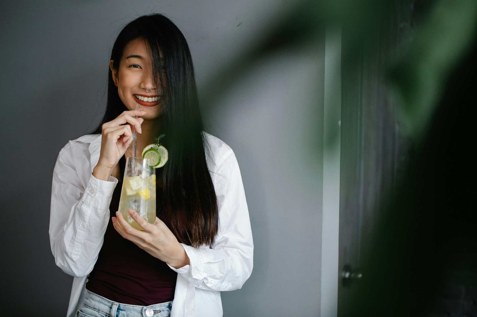 women-happy-drinkig-electrolyte-drink-homemade.